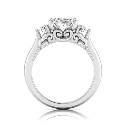 Oval cut lab grown diamond three stone engagement ring featuring a 1.86 carat IGI certified center diamond with round side diamonds in yellow gold.