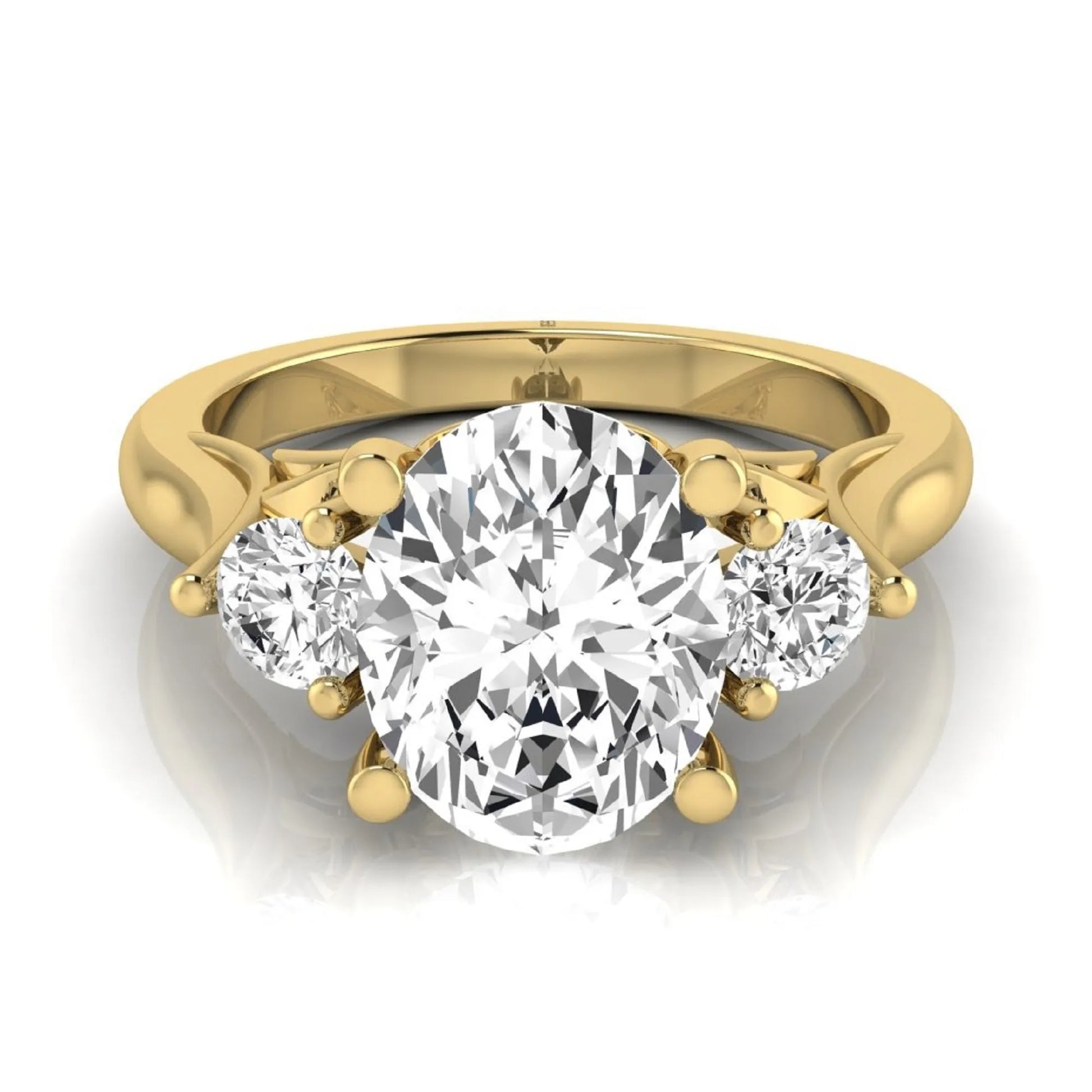 Oval cut lab grown diamond three stone engagement ring featuring a 1.86 carat IGI certified center diamond with round side diamonds in yellow gold.