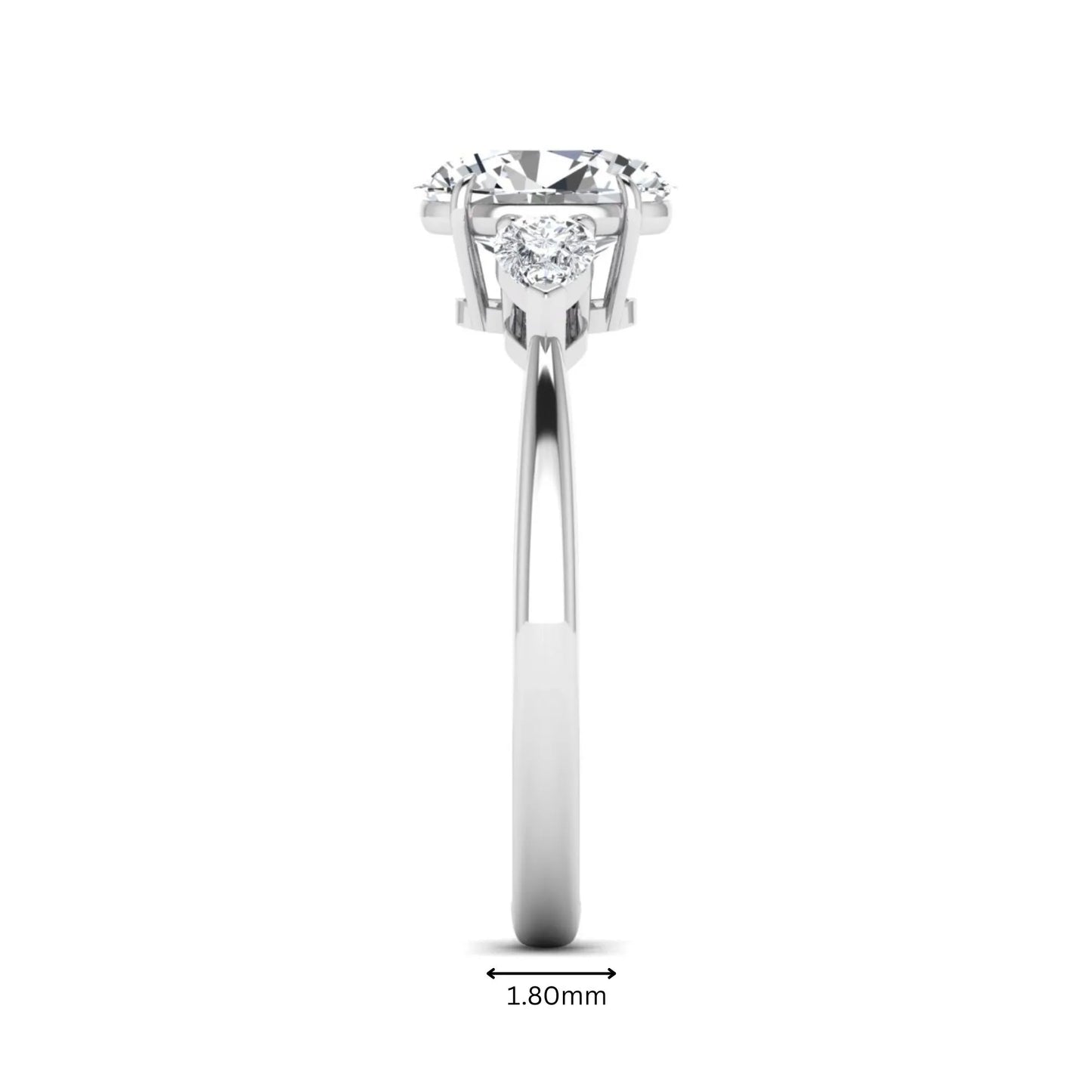 Oval cut lab grown diamond three stone engagement ring with pear cut side diamonds and prong setting in white gold tone.
