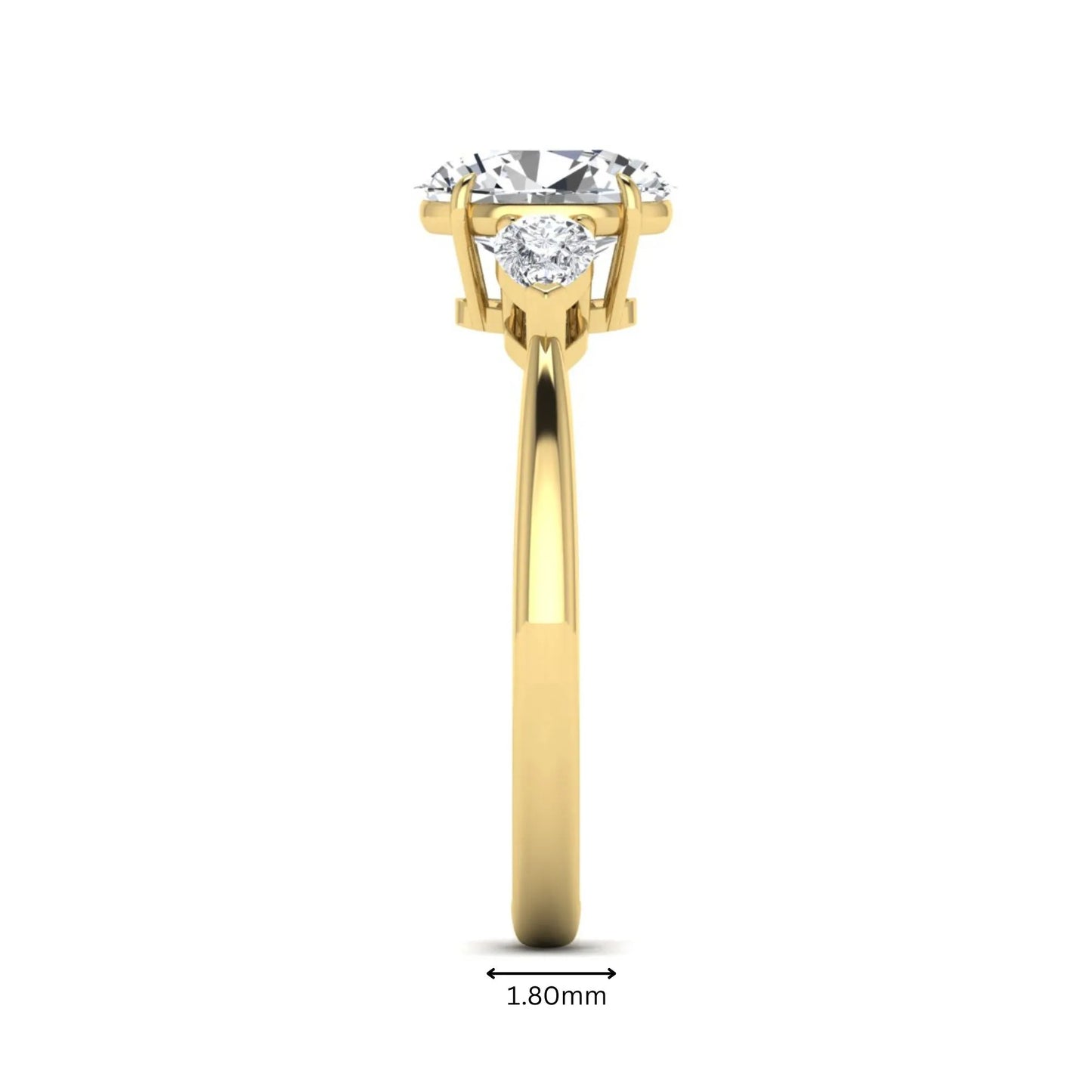 Oval cut lab grown diamond three stone engagement ring with pear cut side diamonds and prong setting in yellow gold tone.