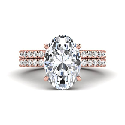 Oval Cut Pavé Solitaire Lab Grown Diamond Engagement Ring Set featuring a 3.92 carat IGI Certified oval diamond with a matching pavé diamond wedding band in rose gold.