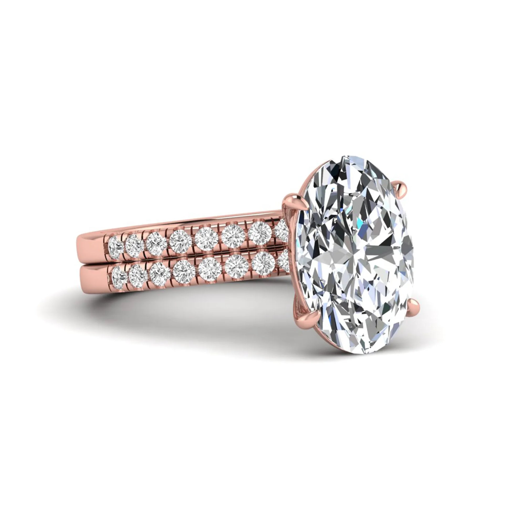 Oval Cut Pavé Solitaire Lab Grown Diamond Engagement Ring Set featuring a 3.92 carat IGI Certified oval diamond with a matching pavé diamond wedding band in rose gold.