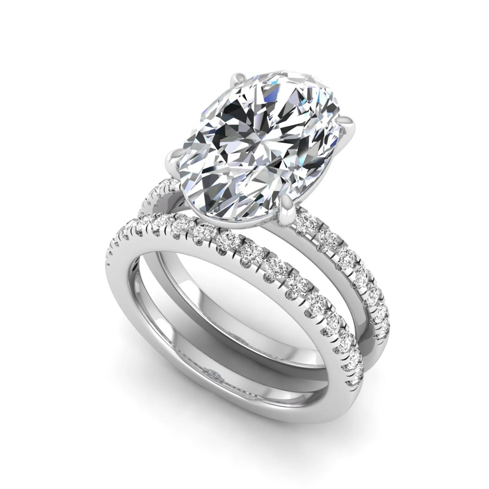 Oval Cut Pavé Solitaire Lab Grown Diamond Engagement Ring Set featuring a 3.92 carat IGI Certified oval diamond with a matching pavé diamond wedding band in white gold.