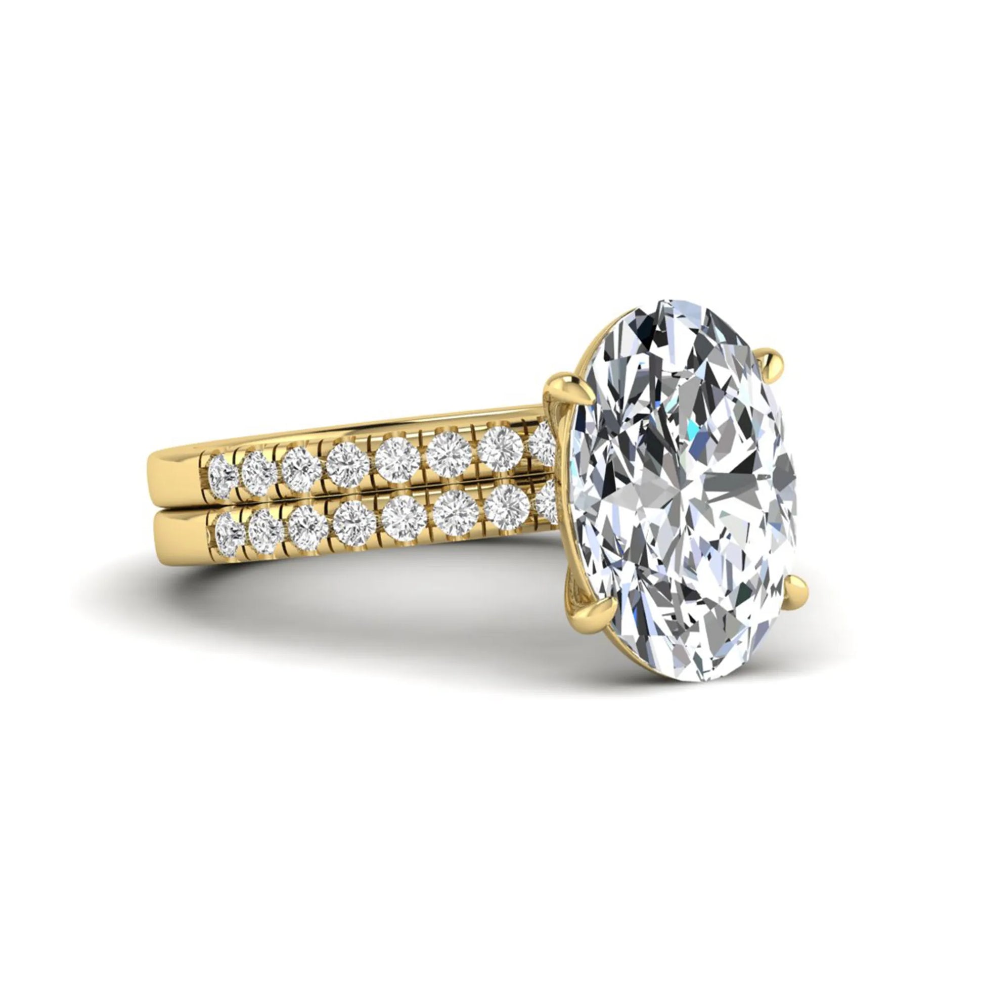 Oval Cut Pavé Solitaire Lab Grown Diamond Engagement Ring Set featuring a 3.92 carat IGI Certified oval diamond with a matching pavé diamond wedding band in yellow gold.