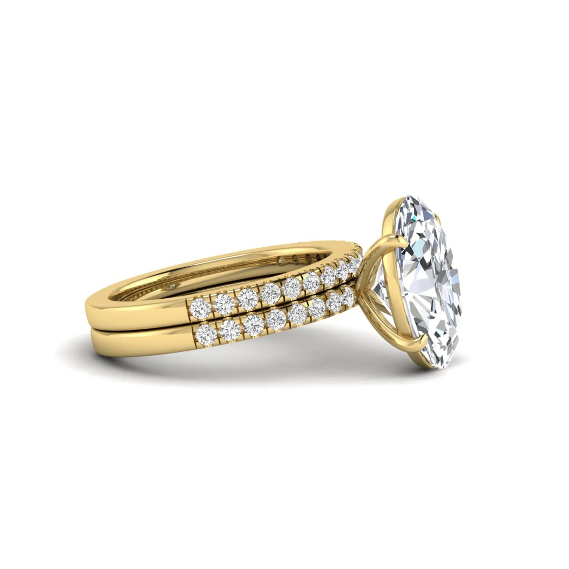 Oval Cut Pavé Solitaire Lab Grown Diamond Engagement Ring Set featuring a 3.92 carat IGI Certified oval diamond with a matching pavé diamond wedding band in yellow gold.