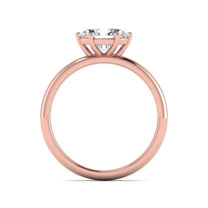 Oval cut solitaire lab grown diamond engagement ring featuring a 1.21 carat IGI certified oval cut center diamond in rose gold.