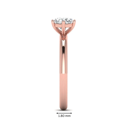Oval cut solitaire lab grown diamond engagement ring featuring a 1.21 carat IGI certified oval cut center diamond in rose gold.