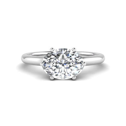 Oval cut solitaire lab grown diamond engagement ring featuring a 1.21 carat IGI certified oval cut center diamond in white gold.