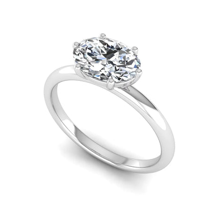 Oval cut solitaire lab grown diamond engagement ring featuring a 1.21 carat IGI certified oval cut center diamond in white gold.