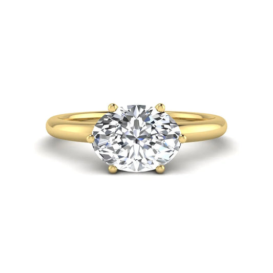 Oval cut solitaire lab grown diamond engagement ring featuring a 1.21 carat IGI certified oval cut center diamond in yellow gold.