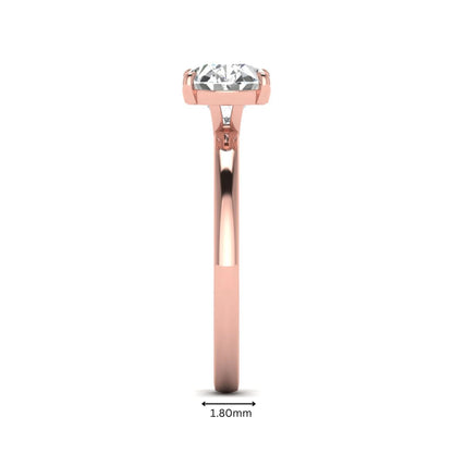 IGI certified oval cut lab grown diamond solitaire engagement ring in rose gold.