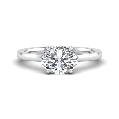 IGI certified oval cut lab grown diamond solitaire engagement ring in white gold.