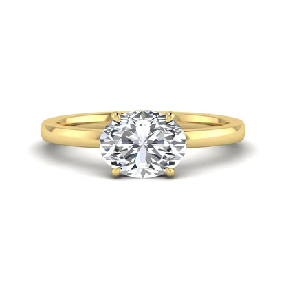 IGI certified oval cut lab grown diamond solitaire engagement ring in yellow gold.