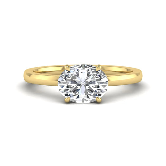 IGI certified oval cut lab grown diamond solitaire engagement ring in yellow gold.