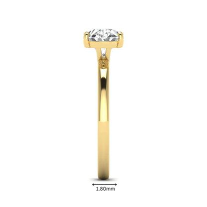 IGI certified oval cut lab grown diamond solitaire engagement ring in yellow gold.