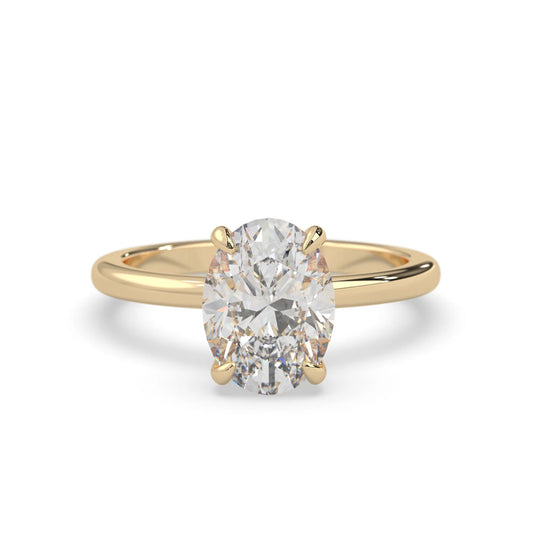 yellow-Gold ring with a large diamond on a white background