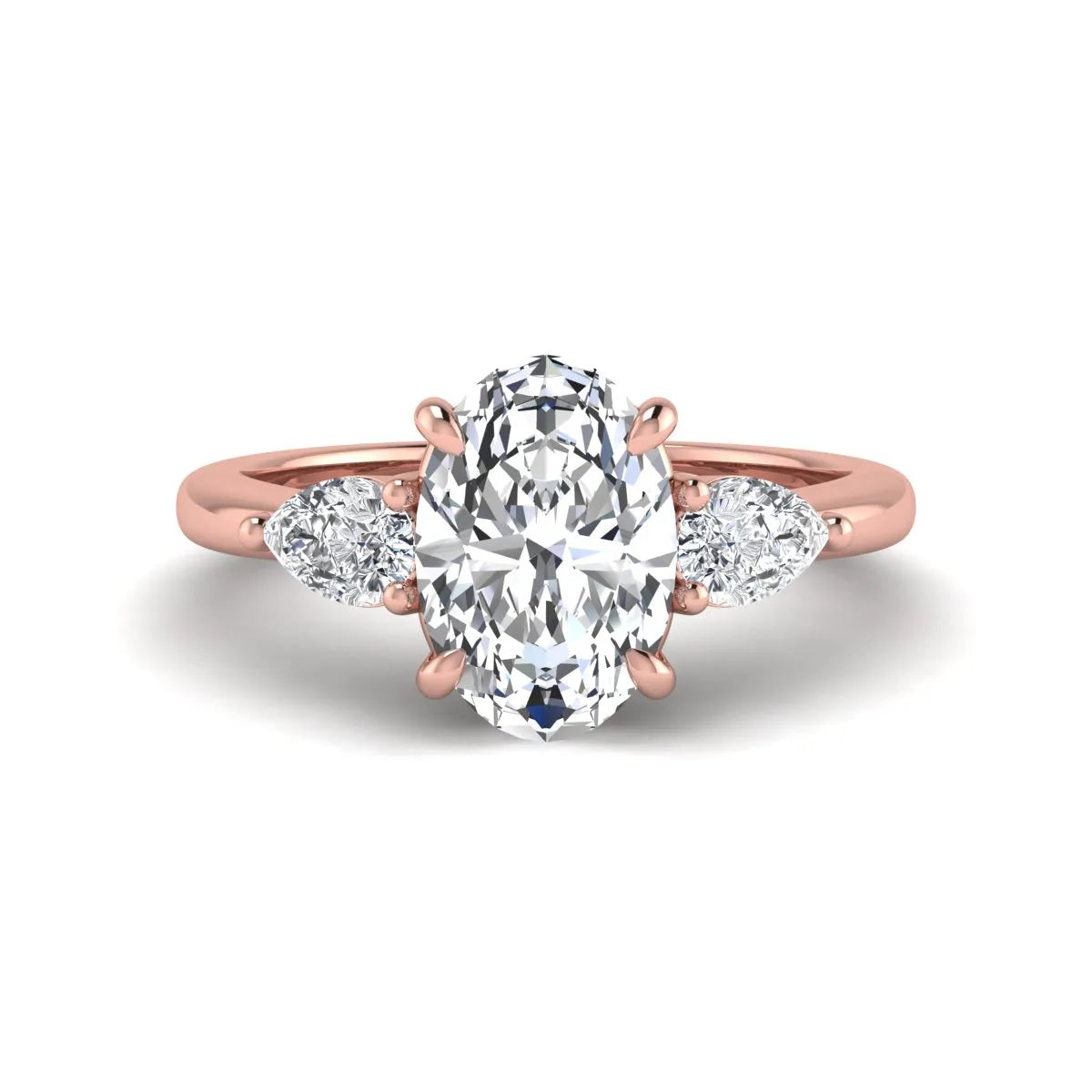 Oval cut three stone lab grown diamond engagement ring in rose gold featuring a 1.31 carat IGI certified center diamond with pear cut side diamonds.