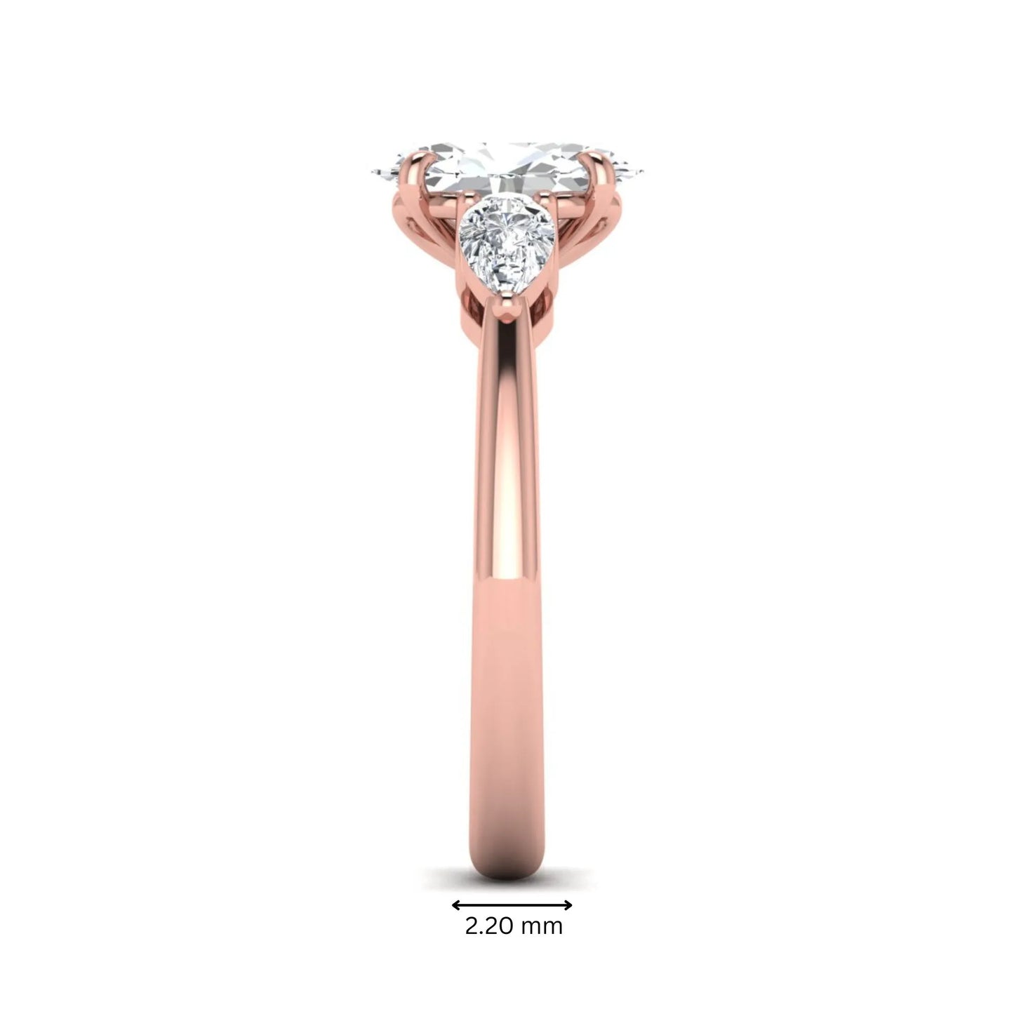 Oval cut three stone lab grown diamond engagement ring in rose gold featuring a 1.31 carat IGI certified center diamond with pear cut side diamonds.