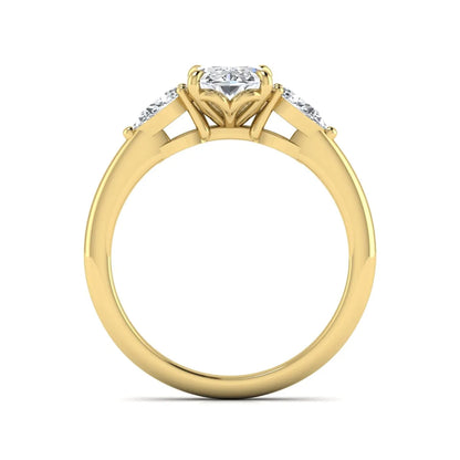 Oval cut three stone lab grown diamond engagement ring in yellow gold featuring a 1.31 carat IGI certified center diamond with pear cut side diamonds.