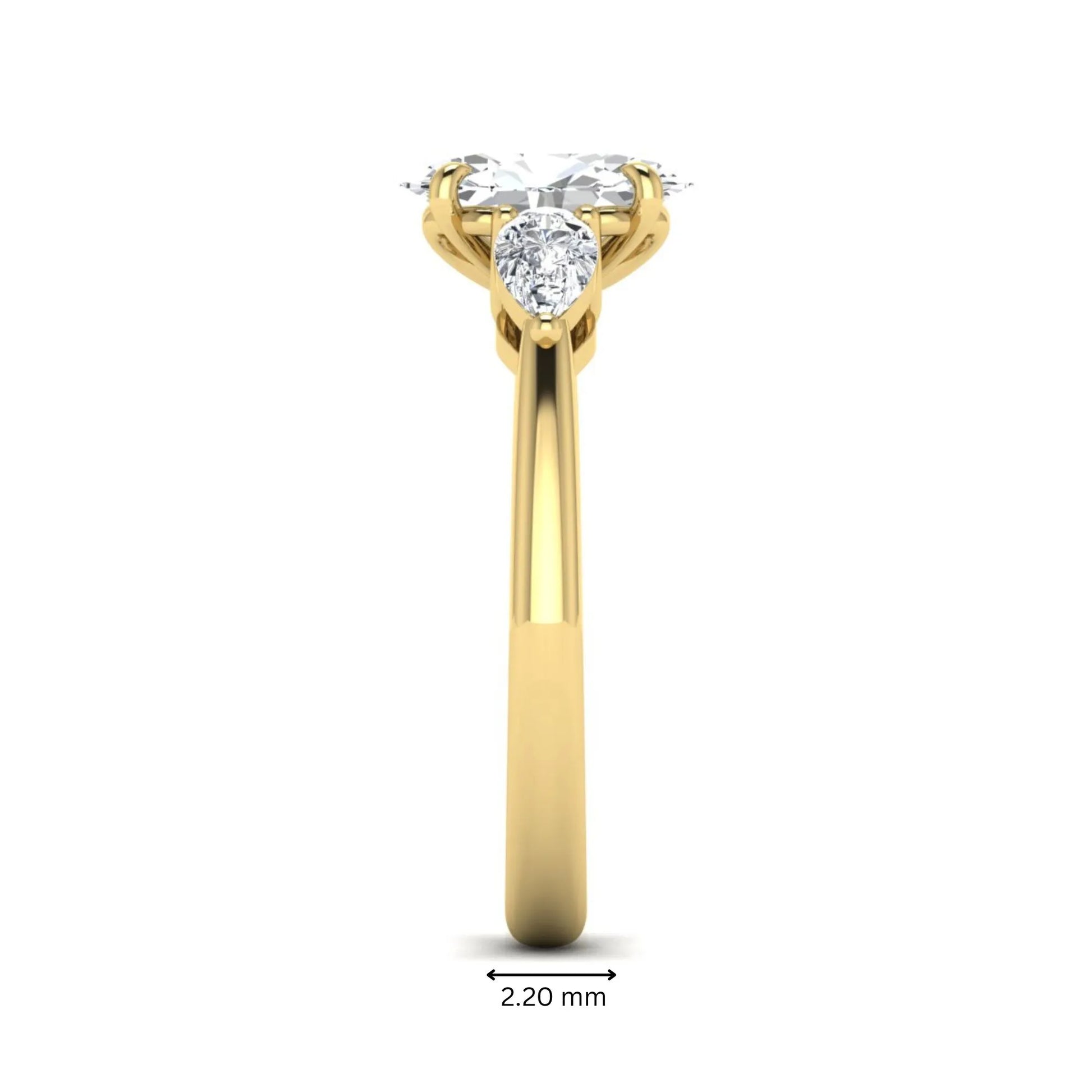 Oval cut three stone lab grown diamond engagement ring in yellow gold featuring a 1.31 carat IGI certified center diamond with pear cut side diamonds.