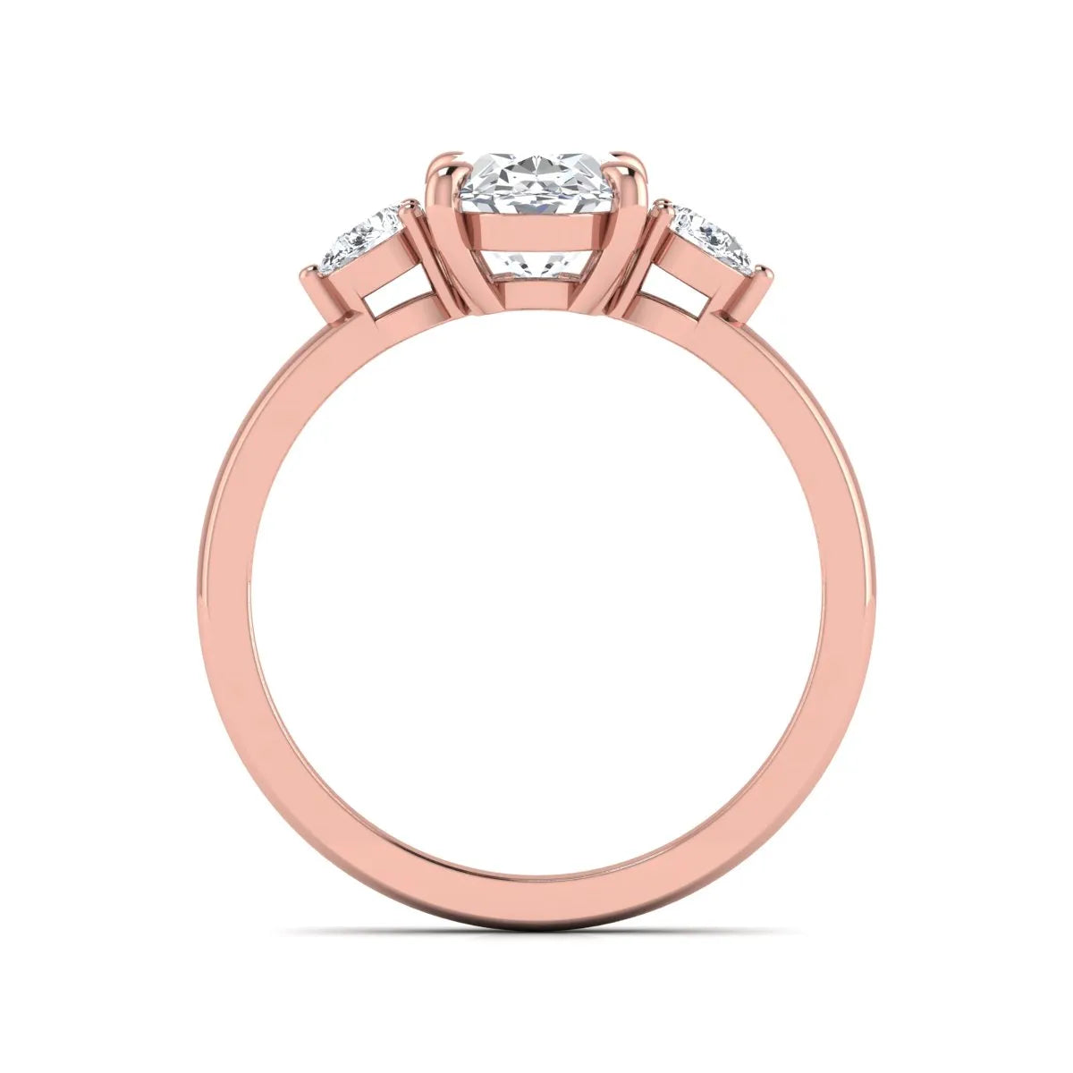 Oval cut lab grown diamond three stone engagement ring with pear side diamonds in rose gold.
