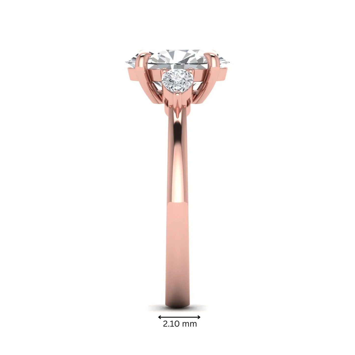 Oval cut lab grown diamond three stone engagement ring with pear side diamonds in rose gold.