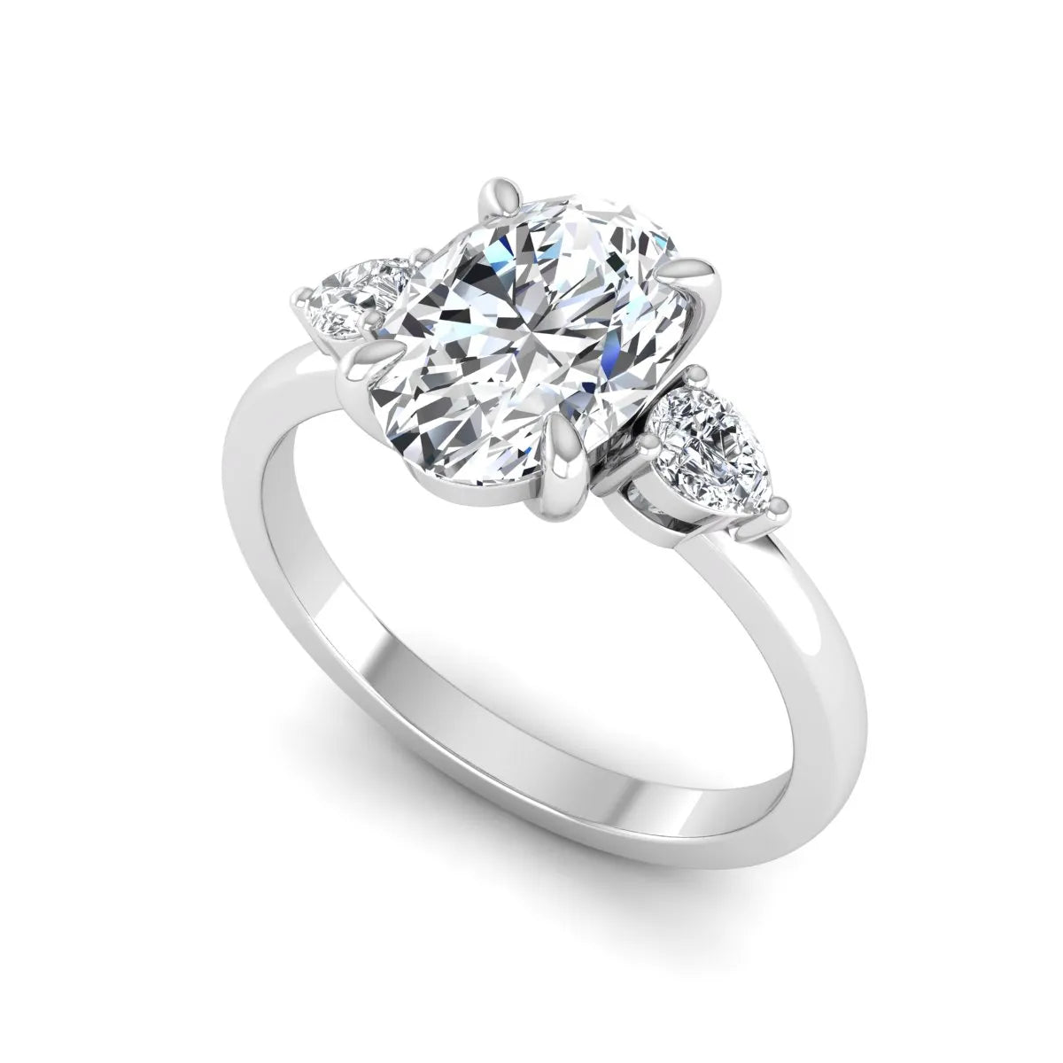 Oval cut lab grown diamond three stone engagement ring with pear side diamonds in white gold.