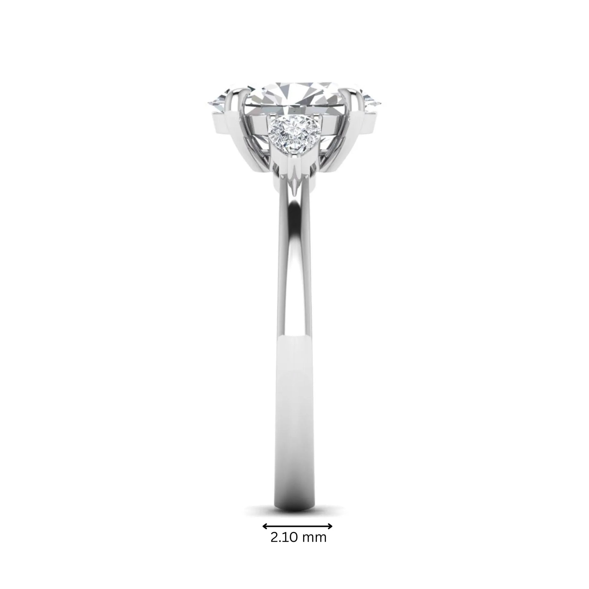 Oval cut lab grown diamond three stone engagement ring with pear side diamonds in white gold.
