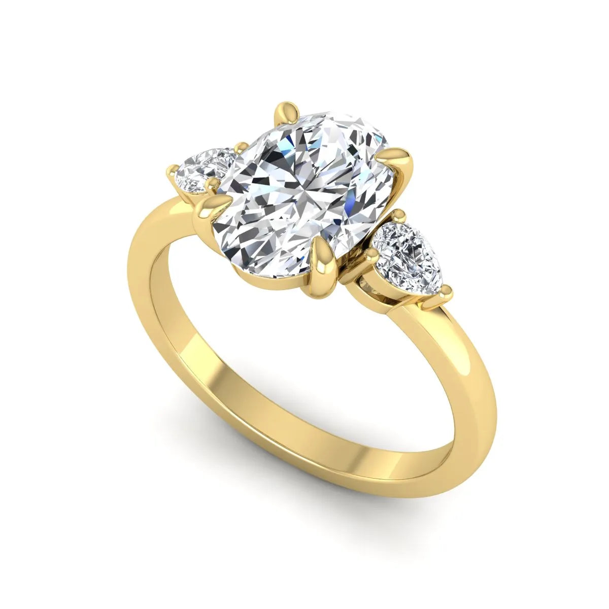 Oval cut lab grown diamond three stone engagement ring with pear side diamonds in yellow gold.
