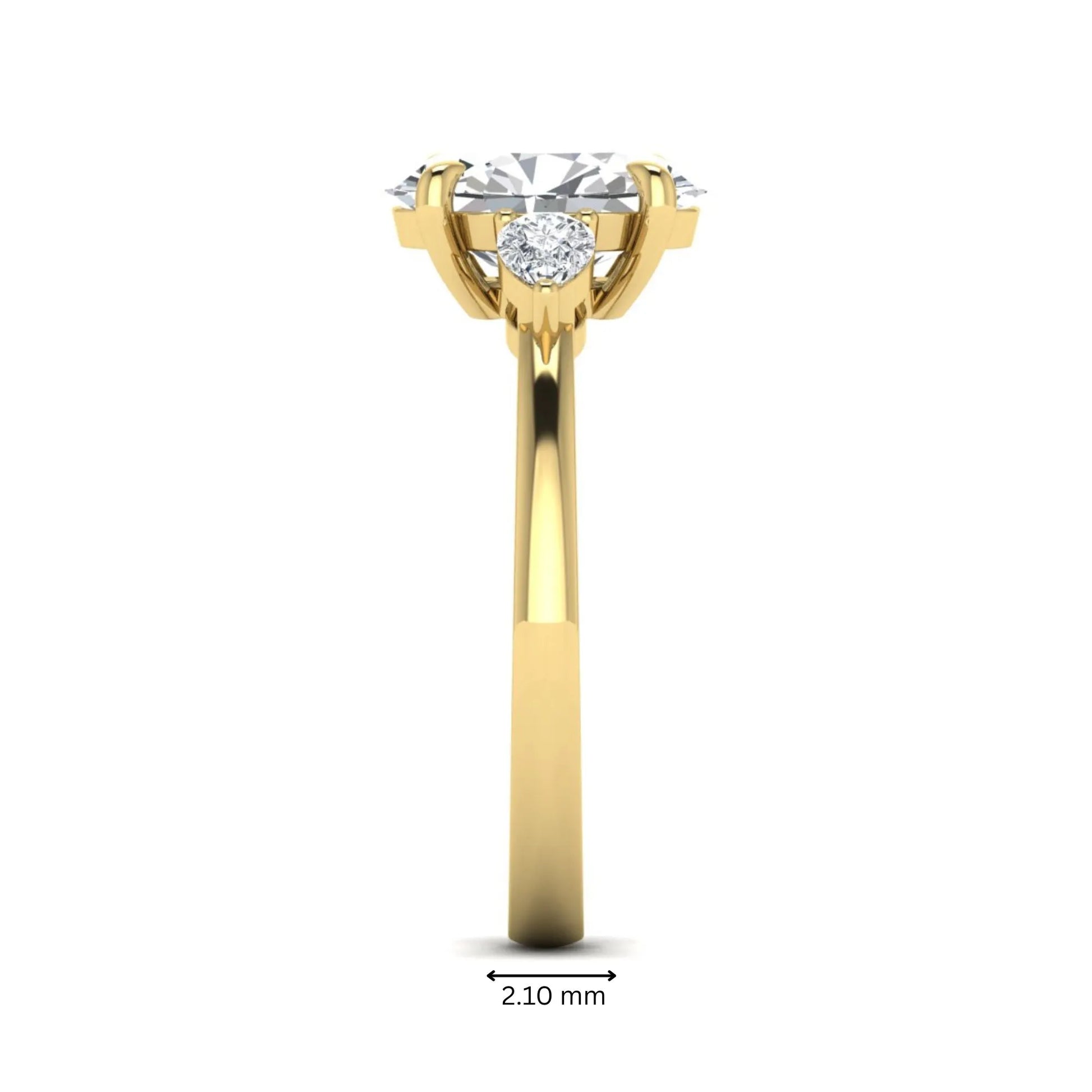 Oval cut lab grown diamond three stone engagement ring with pear side diamonds in yellow gold.