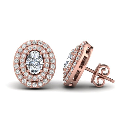Oval cut lab grown diamond stud earrings featuring a double halo of round cut diamonds, prong setting, push back closure, and rose gold tone design.