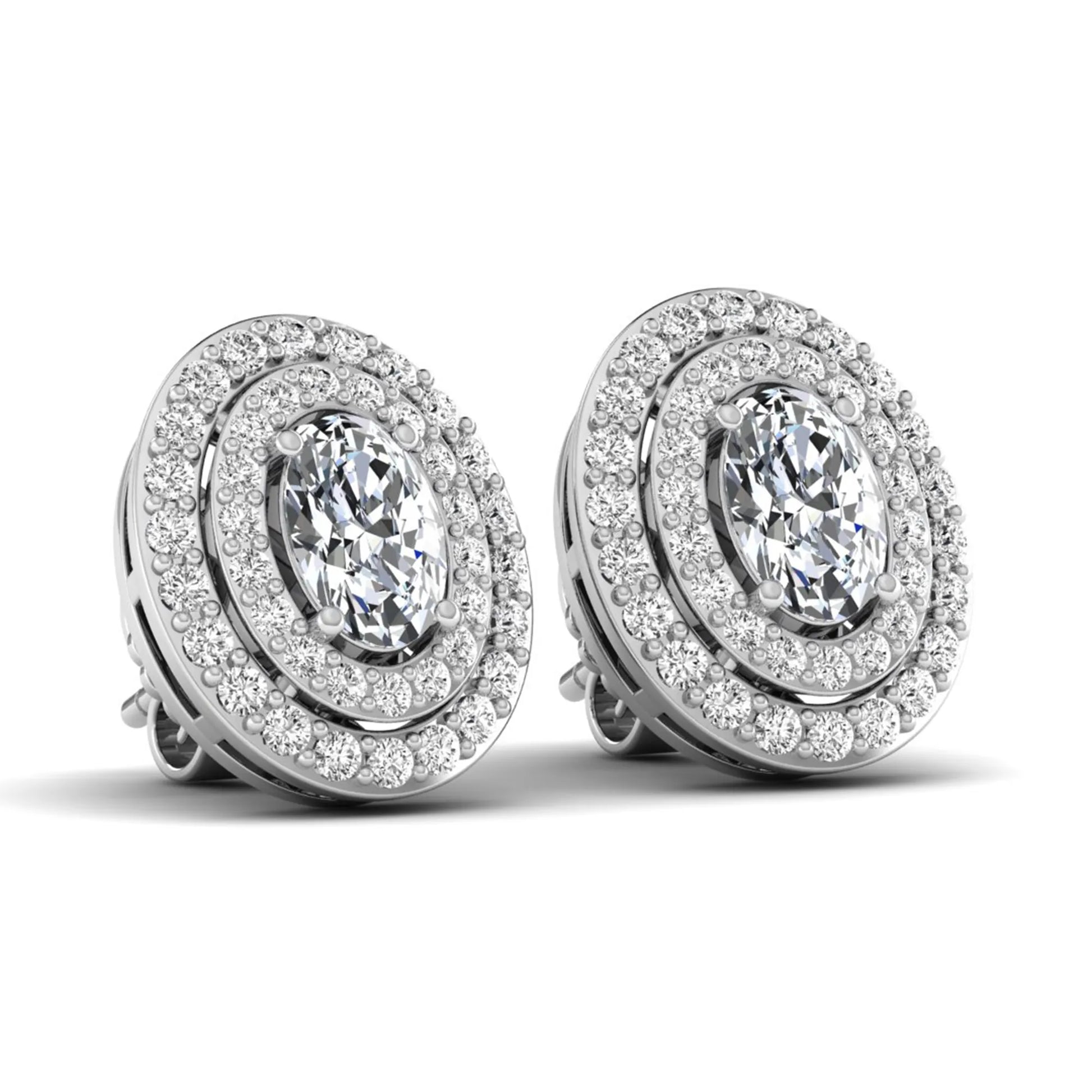 Oval cut lab grown diamond stud earrings featuring a double halo of round cut diamonds, prong setting, push back closure, and white gold tone design.