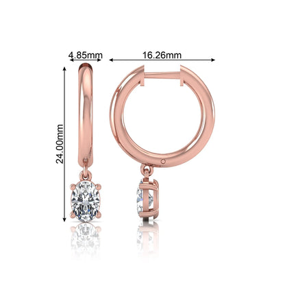 Oval cut lab grown diamond drop huggie hoop earrings featuring a four prong drop setting, hinged snap closure, and polished rose gold tone finish.