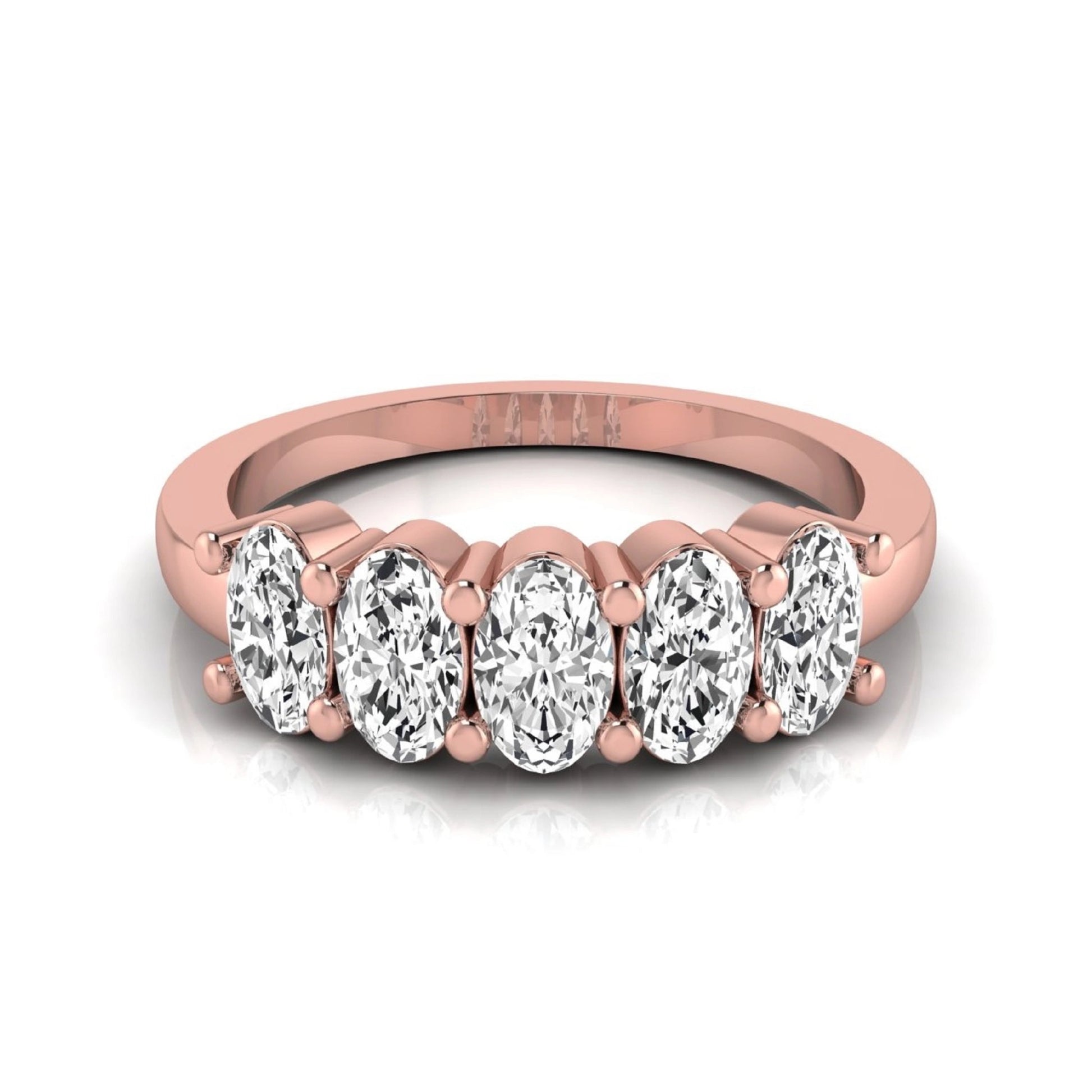 Oval five stone lab grown diamond anniversary ring featuring five oval cut diamonds in an elegant shared prong setting in rose gold