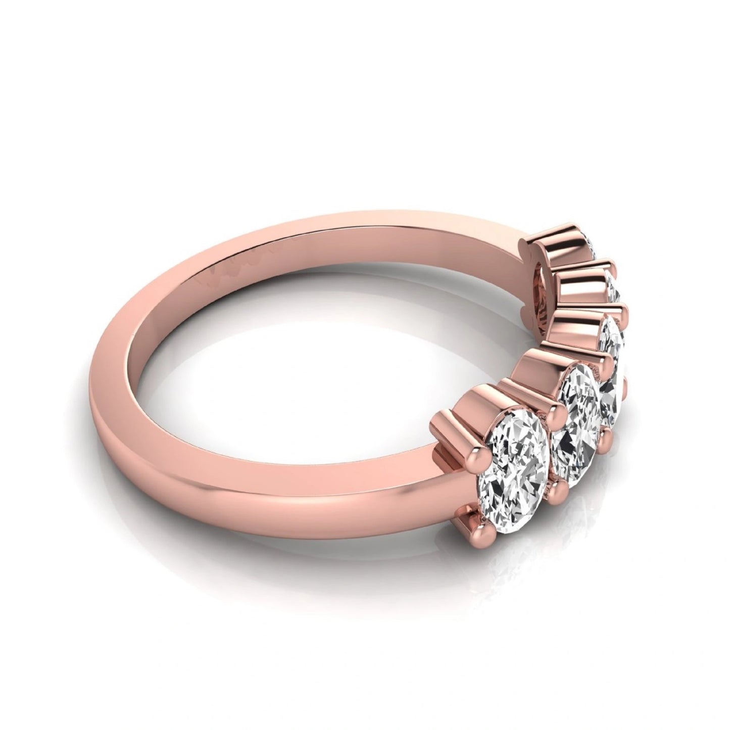 Oval five stone lab grown diamond anniversary ring featuring five oval cut diamonds in an elegant shared prong setting in rose gold