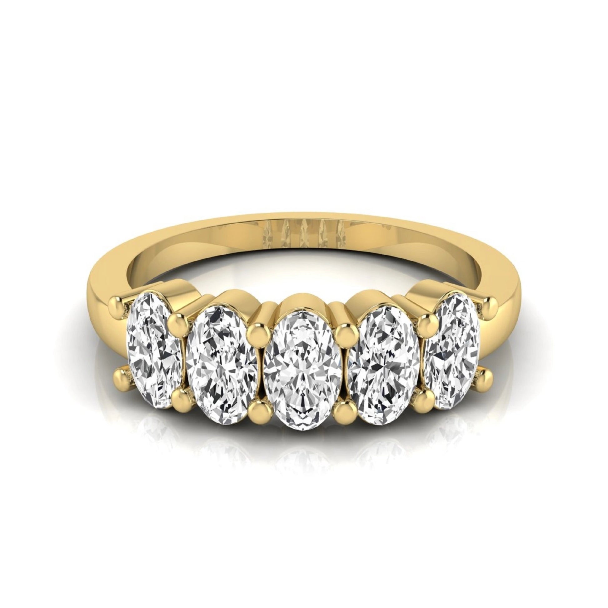 Oval five stone lab grown diamond anniversary ring featuring five oval cut diamonds in an elegant shared prong setting in yellow gold