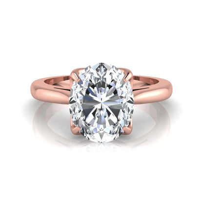 Oval cut lab grown diamond solitaire engagement ring featuring a classic four-prong setting with a rose gold tone band.
