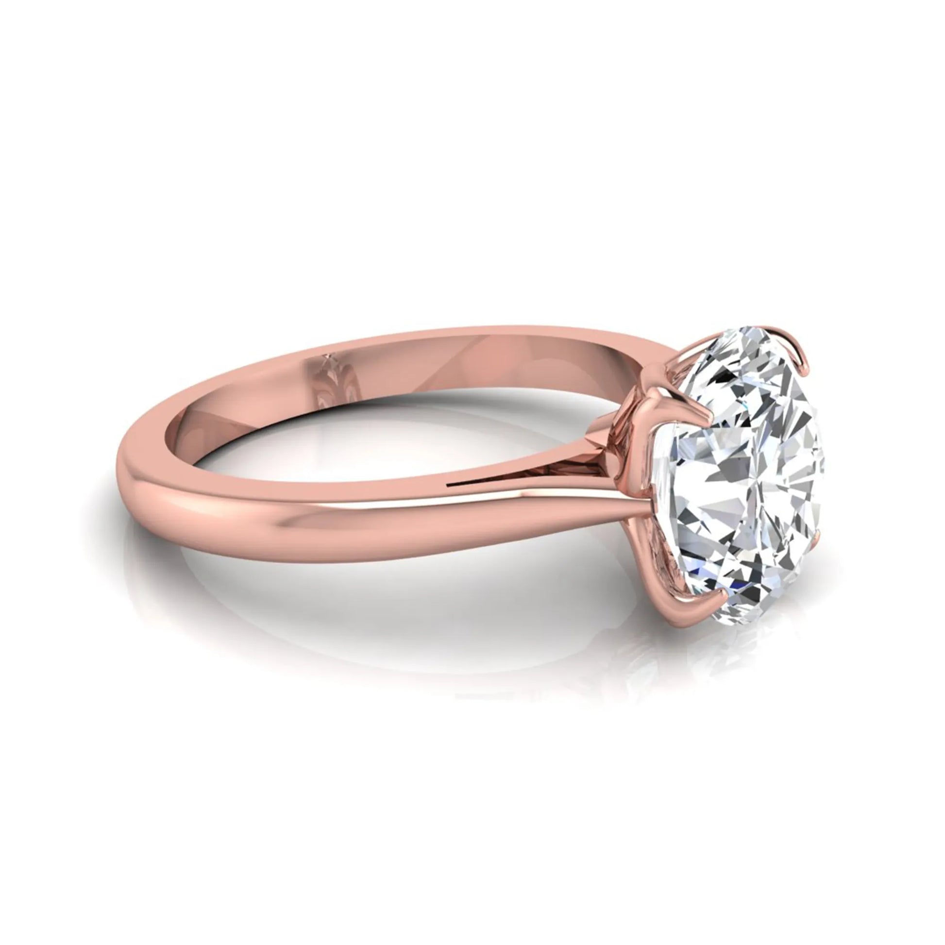 Oval cut lab grown diamond solitaire engagement ring featuring a classic four-prong setting with a rose gold tone band.