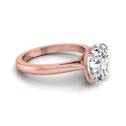 Oval cut lab grown diamond solitaire engagement ring featuring a classic four-prong setting with a rose gold tone band.