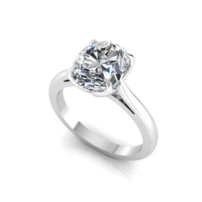 Oval cut lab grown diamond solitaire engagement ring featuring a classic four-prong setting with a white gold tone band.