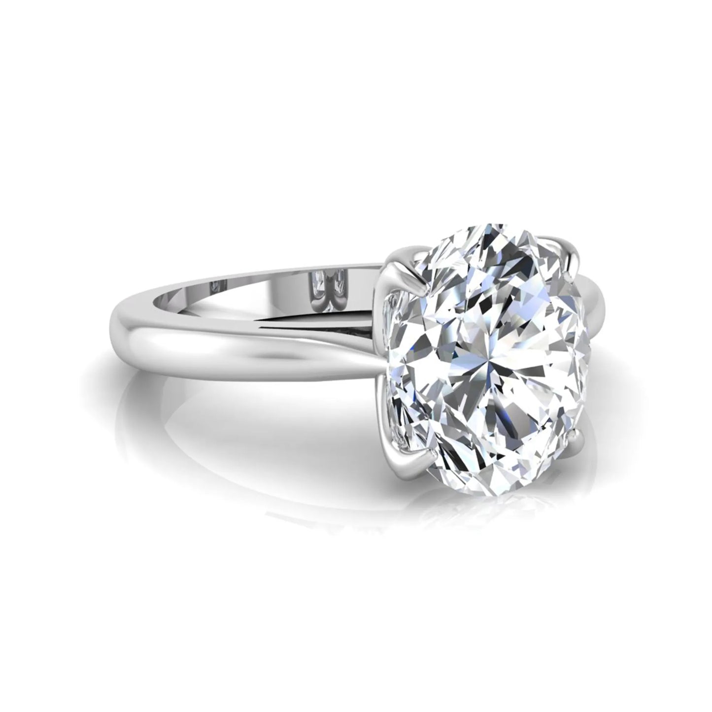 Oval cut lab grown diamond solitaire engagement ring featuring a classic four-prong setting with a white gold tone band.