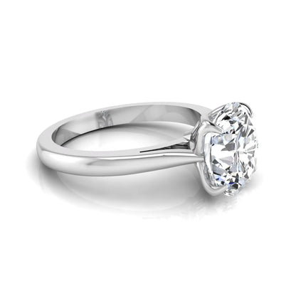Oval cut lab grown diamond solitaire engagement ring featuring a classic four-prong setting with a white gold tone band.