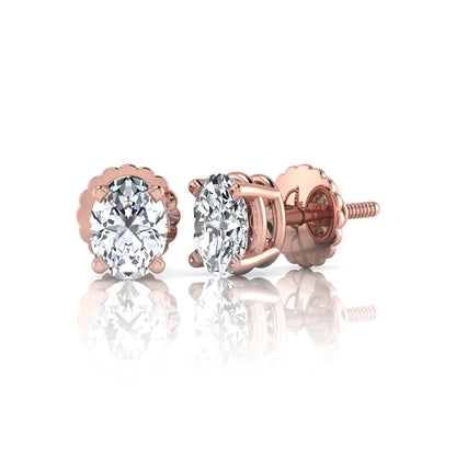 rose gold Oval cut lab grown diamond stud earrings with four prong setting and screw back closure