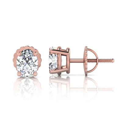 rose gold Oval cut lab grown diamond stud earrings with four prong setting and screw back closure