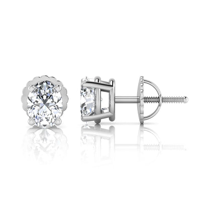 white gold Oval cut lab grown diamond stud earrings with four prong setting and screw back closure