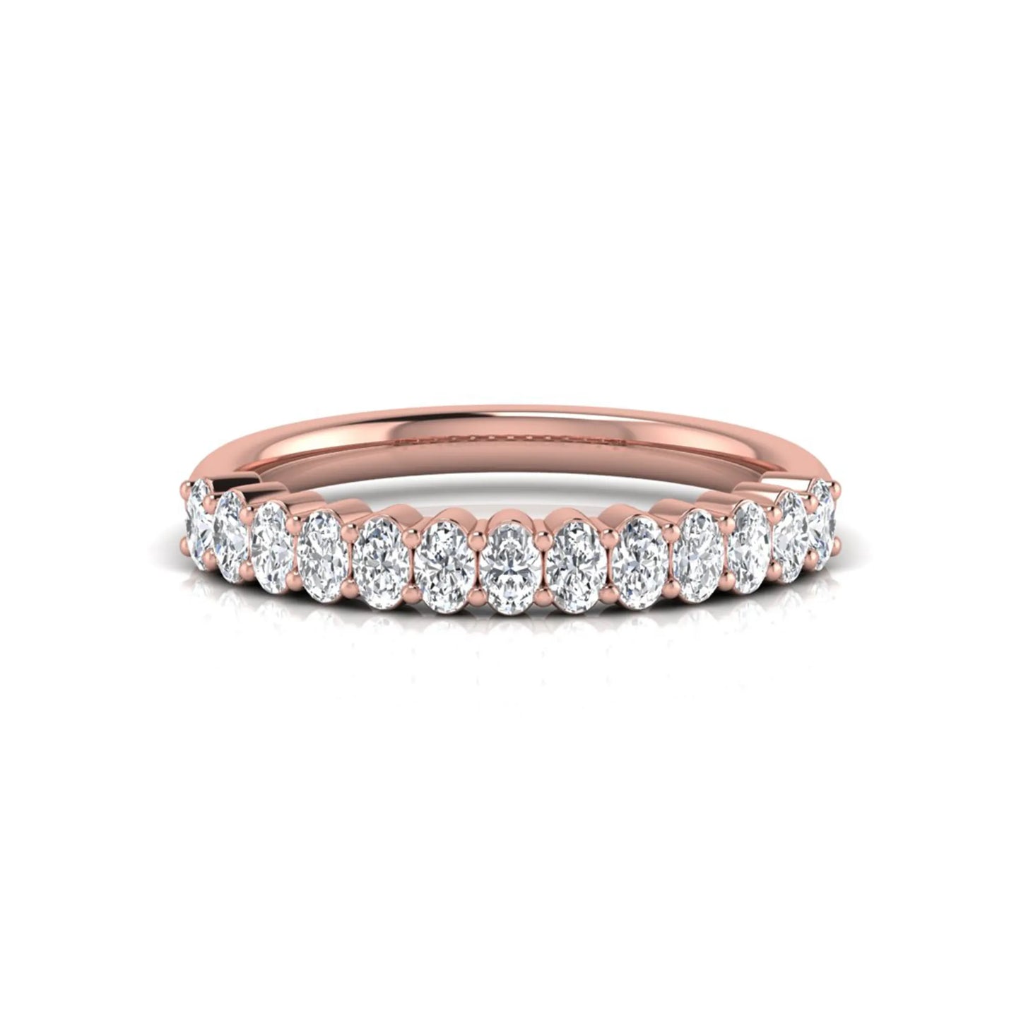 Oval cut lab grown diamond half eternity wedding band in rose gold tone
