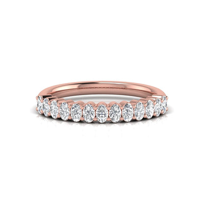 Oval cut lab grown diamond half eternity wedding band in rose gold tone