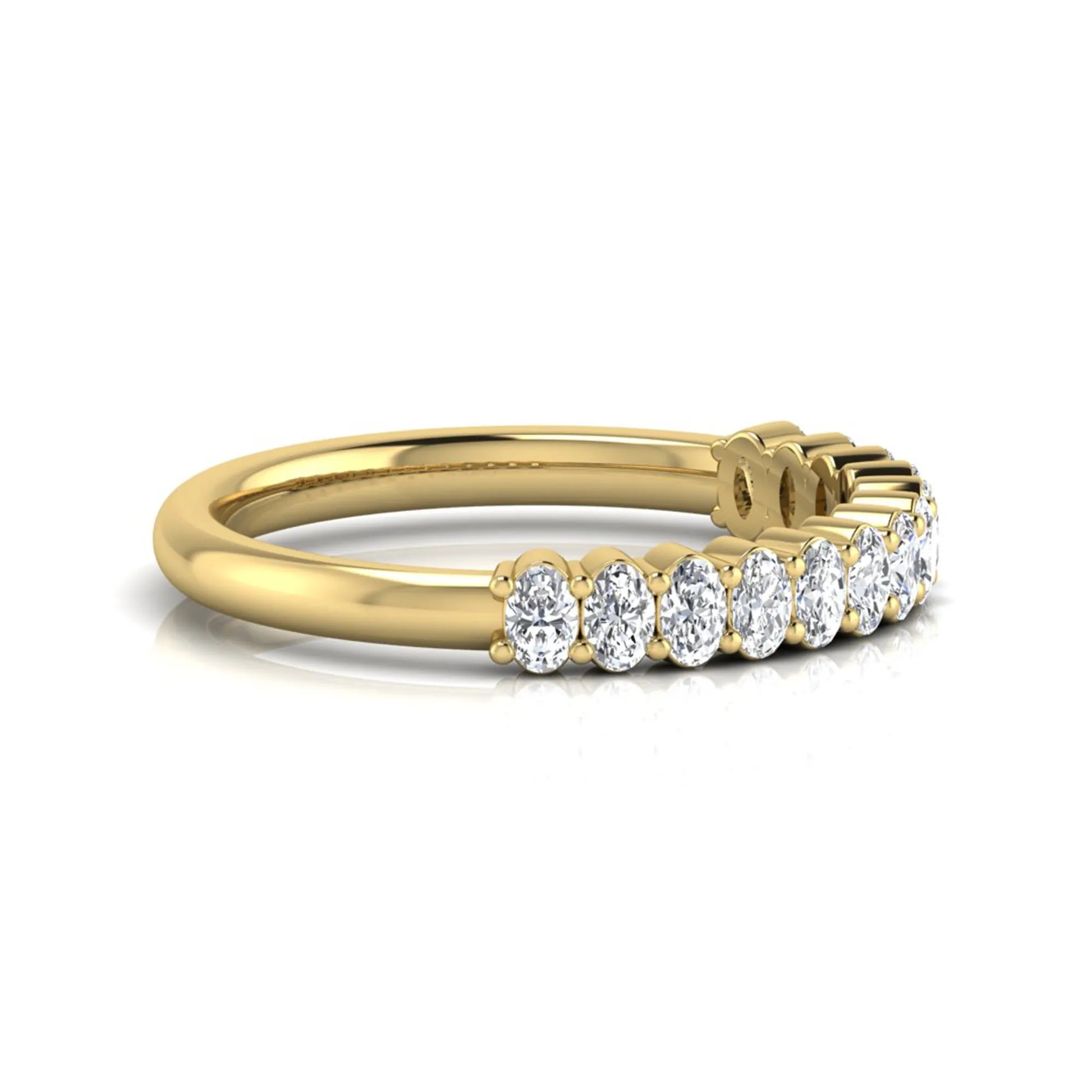 Oval cut lab grown diamond half eternity wedding band in yellow gold tone