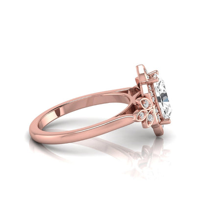 Oval cut lab grown diamond floral halo engagement ring with round diamond accents in rose gold style.