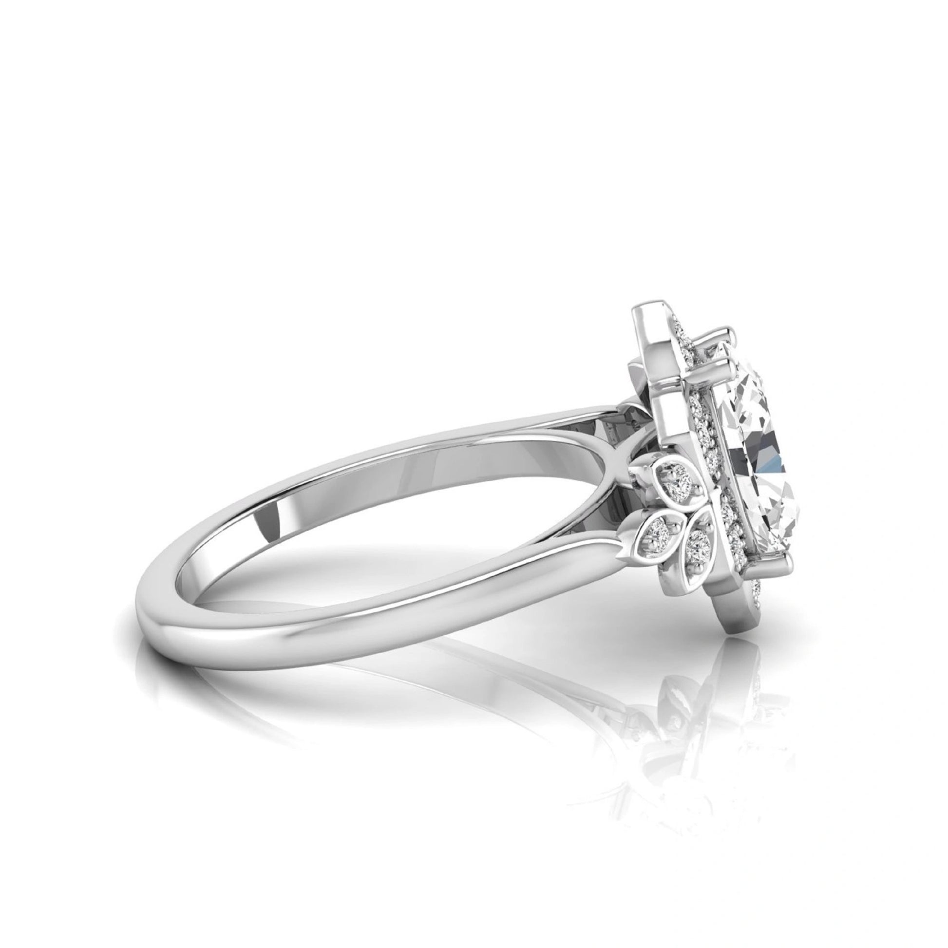 Oval cut lab grown diamond floral halo engagement ring with round diamond accents in white gold style.